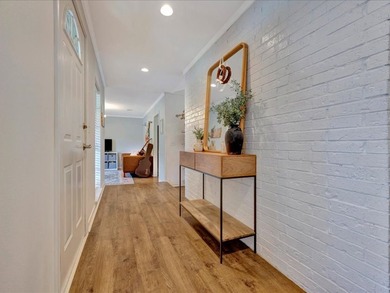 Crown Colony gem! This inviting 3-bedroom, 2-bath home sits on a - photo 5