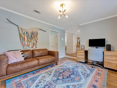 Crown Colony gem! This inviting 3-bedroom, 2-bath home sits on a - photo 6
