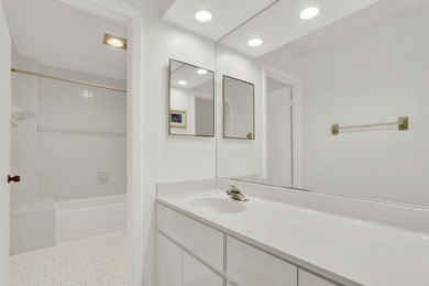 Steps from the beach, this inviting residence at 115 Bamboo Rd - photo 16