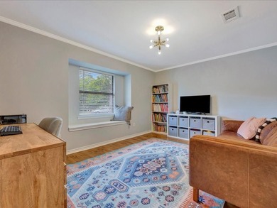 Crown Colony gem! This inviting 3-bedroom, 2-bath home sits on a - photo 7