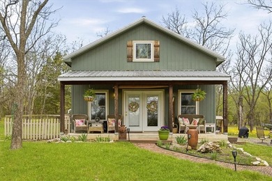 Charming 1 bed, 1 bath home with loft-style bedroom in the gated - photo 1