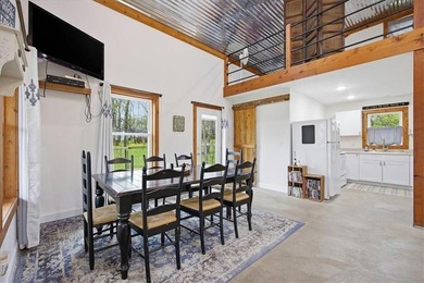 Charming 1 bed, 1 bath home with loft-style bedroom in the gated - photo 9