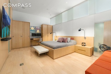 A full-floor loft in the heart of SoHo, this expansive 3-bedroom - photo 13