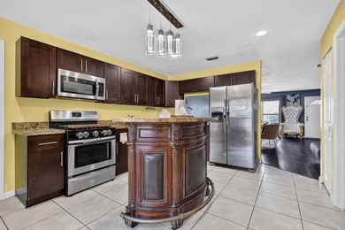pack your bags and moving into this cozy 4 bedroom 2 bath with - photo 16