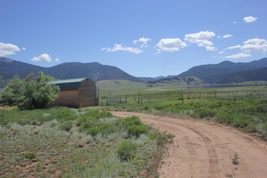87 acres of pure bliss overlooking Eagle Nest Lake and - photo 3