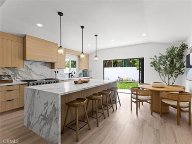 Beautifully Reimagined with a Warm Coastal-Modern Design, this - photo 2