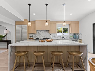Beautifully Reimagined with a Warm Coastal-Modern Design, this - photo 5
