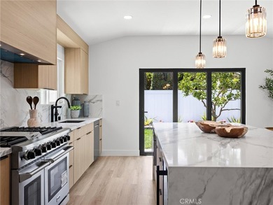 Beautifully Reimagined with a Warm Coastal-Modern Design, this - photo 7
