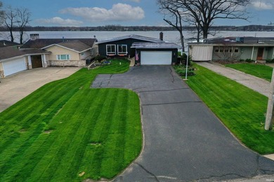 Enjoy perfect lake views every single day from the living room - photo 2
