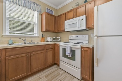 Move in ready 2BR/2BA fully furnished SECOND FLOOR END UNIT with - photo 6