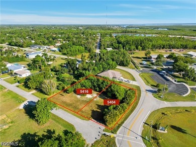 Welcome to 5404 Avenue D, Bokeelia, FL 33922! This prime corner - photo 1