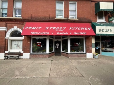 Fantastic business opportunity! This updated building is - photo 1