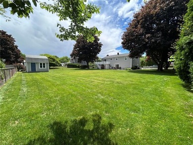 Discover the potential of this raised ranch located in the - photo 2