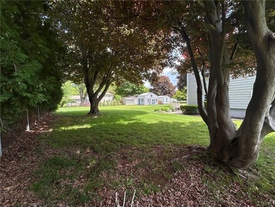 Discover the potential of this raised ranch located in the - photo 4