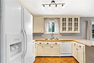 Discover the potential of this raised ranch located in the - photo 10