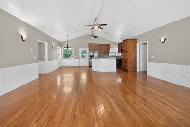 Located on a spacious corner lot, this waterfront 3-bedroom - photo 6