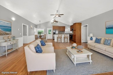 Located on a spacious corner lot, this waterfront 3-bedroom - photo 7