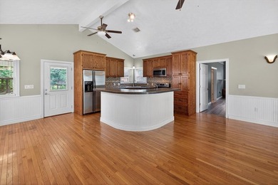 Located on a spacious corner lot, this waterfront 3-bedroom - photo 8
