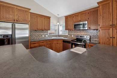 Located on a spacious corner lot, this waterfront 3-bedroom - photo 10