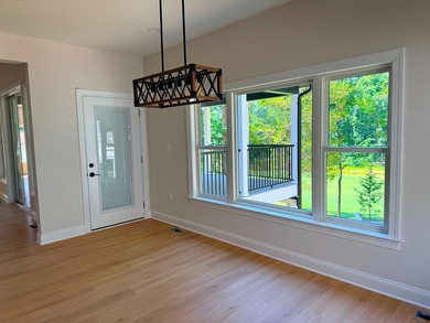 Nestled in the prestigious Lake of the Woods community, this - photo 7