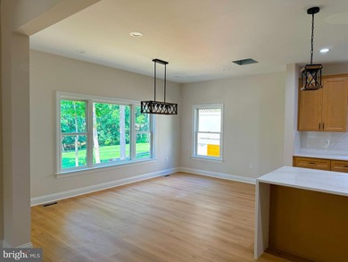 Nestled in the prestigious Lake of the Woods community, this - photo 9
