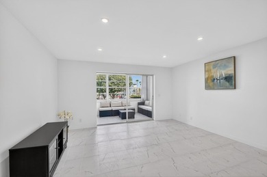 * BLDG is FHA APPROVED. Beautifully renovated 2nd-floor corner - photo 11