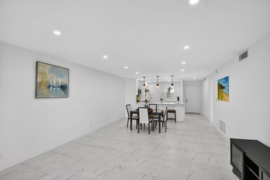 * BLDG is FHA APPROVED. Beautifully renovated 2nd-floor corner - photo 12