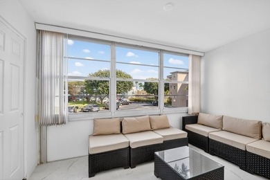 * BLDG is FHA APPROVED. Beautifully renovated 2nd-floor corner - photo 14