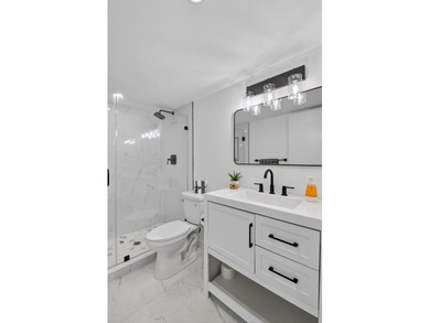* BLDG is FHA APPROVED. Beautifully renovated 2nd-floor corner - photo 23