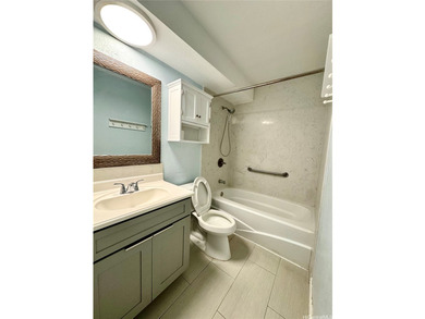 Fee simple 1-bedroom, 1-bath condo with 1 covered parking stall - photo 3