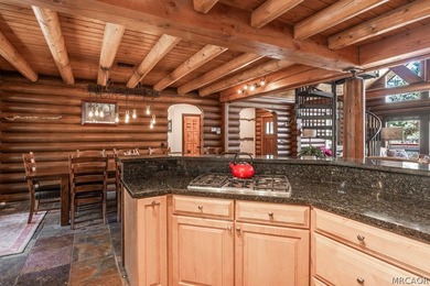 Nestled among the pines on a beautifully wooded acre, this - photo 13