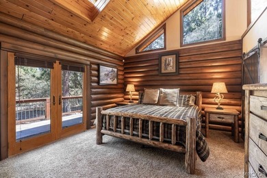 Nestled among the pines on a beautifully wooded acre, this - photo 14