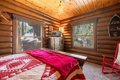 Nestled among the pines on a beautifully wooded acre, this - photo 19