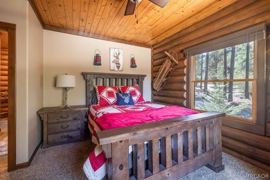 Nestled among the pines on a beautifully wooded acre, this - photo 20