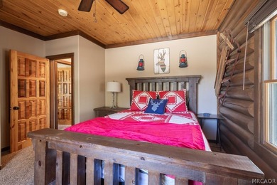 Nestled among the pines on a beautifully wooded acre, this - photo 21