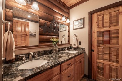 Nestled among the pines on a beautifully wooded acre, this - photo 22