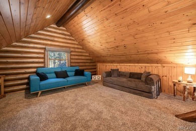 Nestled among the pines on a beautifully wooded acre, this - photo 27