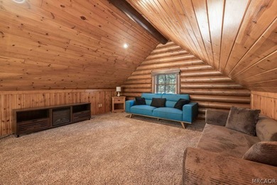 Nestled among the pines on a beautifully wooded acre, this - photo 28