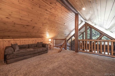 Nestled among the pines on a beautifully wooded acre, this - photo 29