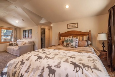 Nestled among the pines on a beautifully wooded acre, this - photo 33