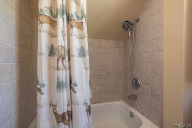 Nestled among the pines on a beautifully wooded acre, this - photo 36