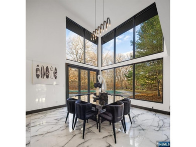 Welcome to this striking, fully-renovated modern masterpiece set - photo 4