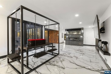 Welcome to this striking, fully-renovated modern masterpiece set - photo 5