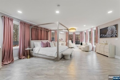 Welcome to this striking, fully-renovated modern masterpiece set - photo 9