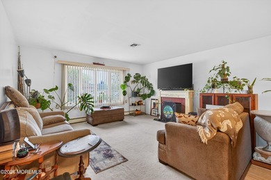 Welcome to this sought-after Castle Harbor model nestled within - photo 3