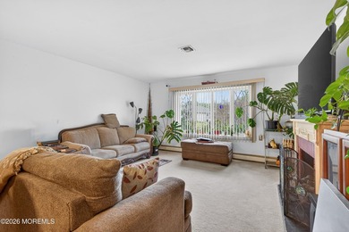 Welcome to this sought-after Castle Harbor model nestled within - photo 4