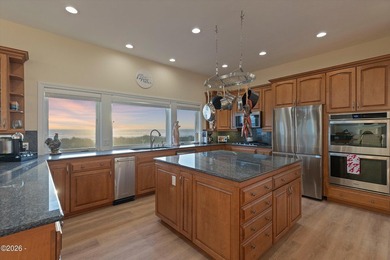 Perched at the edge of the Pacific within the exclusive gated - photo 16