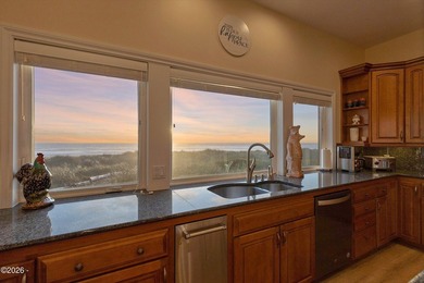 Perched at the edge of the Pacific within the exclusive gated - photo 18