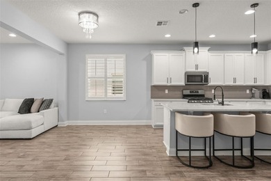 **This house comes with a REDUCED RATE through the seller's - photo 16