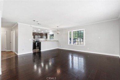 This two-story, townhouse-style condominium offers two primary - photo 4